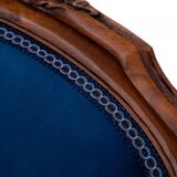 A late 19th-century French bergère armchair. After renovation.