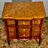 Transition style chest of drawers in rosewood and violet wood, ebony and gilded bronzes