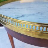 Louis XVI-style boiler table on marble