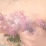 Portrait of a young girl with lilacs