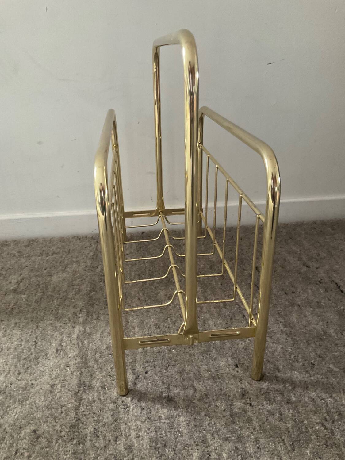 Vintage magazine holder in gold metal
