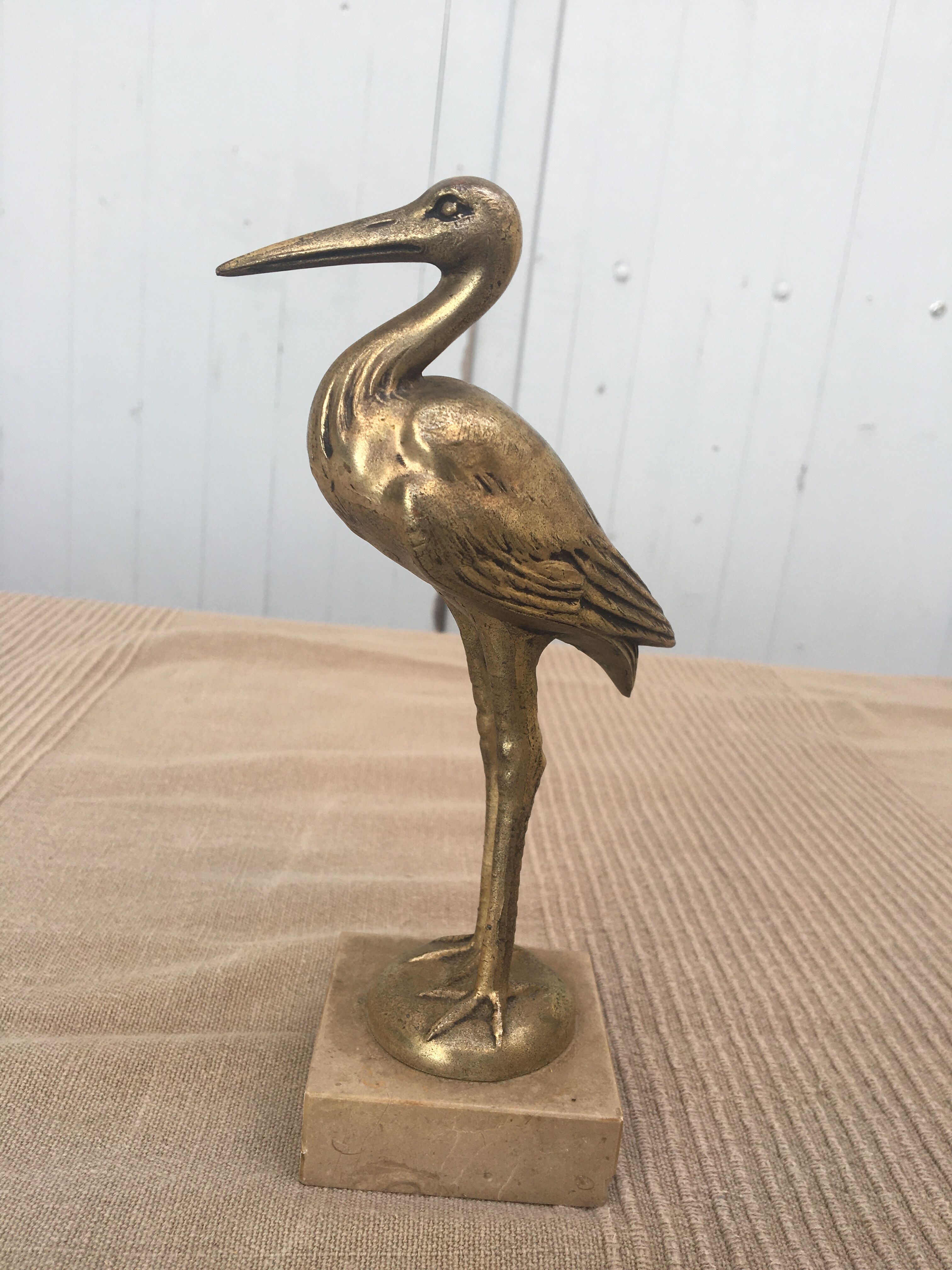 Heron brass statuette