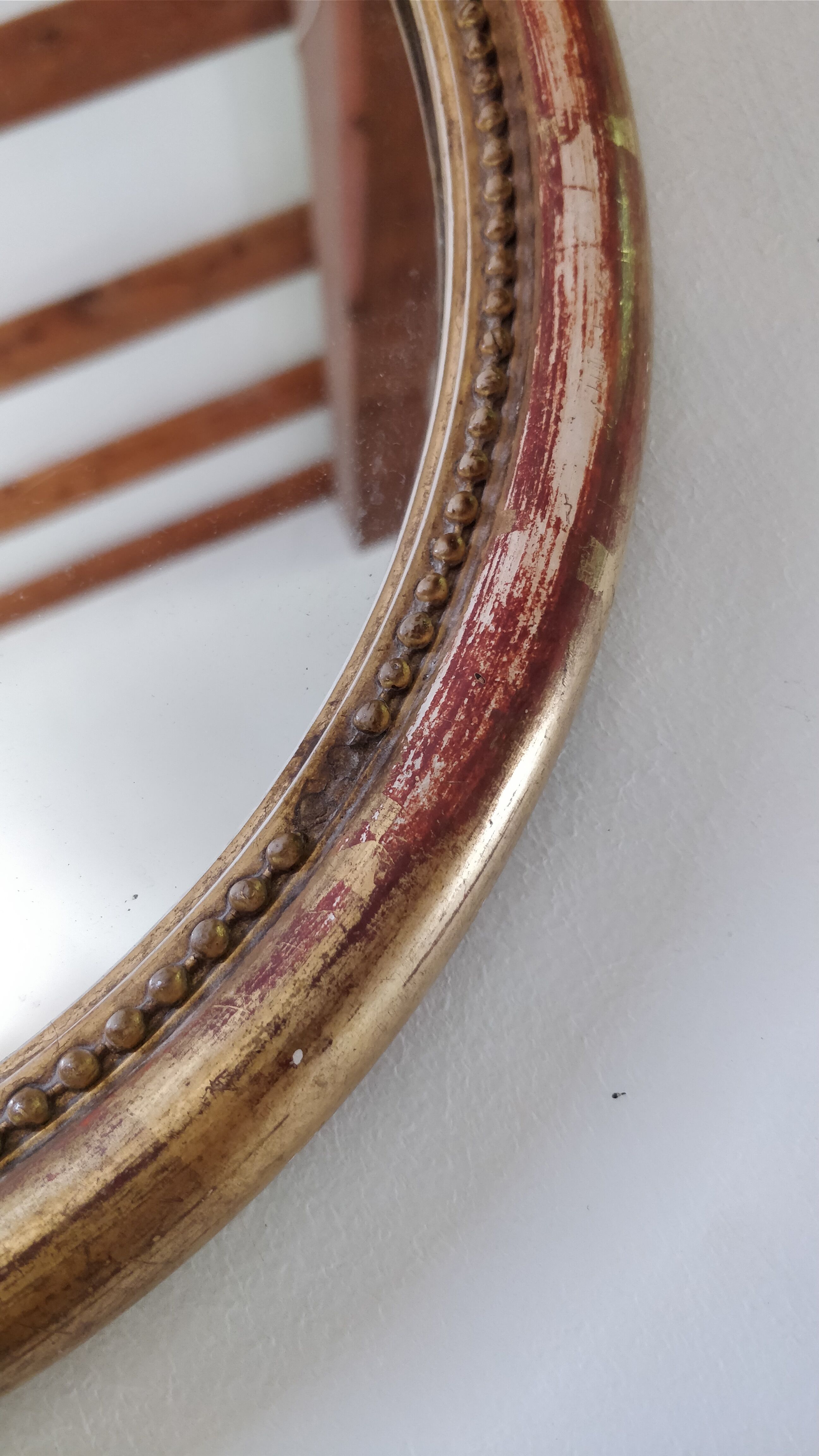 Golden oval mirror 41/35 cm