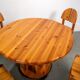 Ranier Daumiller dining room set with 4 chairs and round dining table