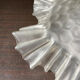 Transparent molded glass suspension in flower shape
