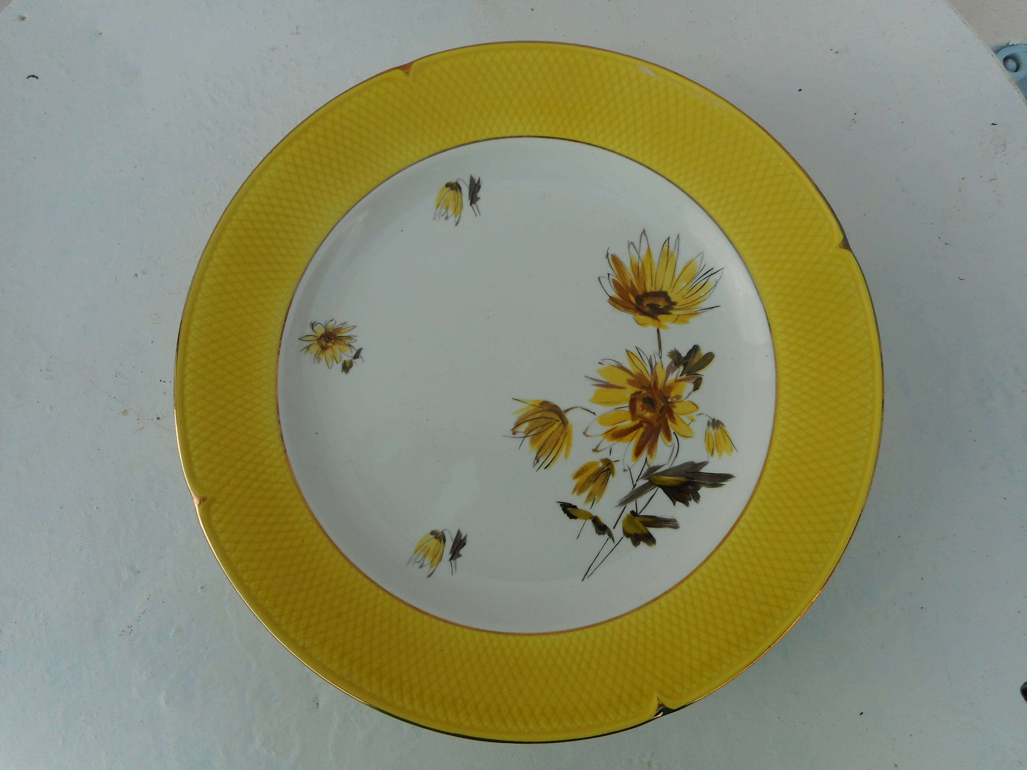 Set of six flat earthenware plates