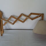 Wall lamp adjustable in length