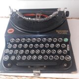 Machine à écrire ancienne remington portable