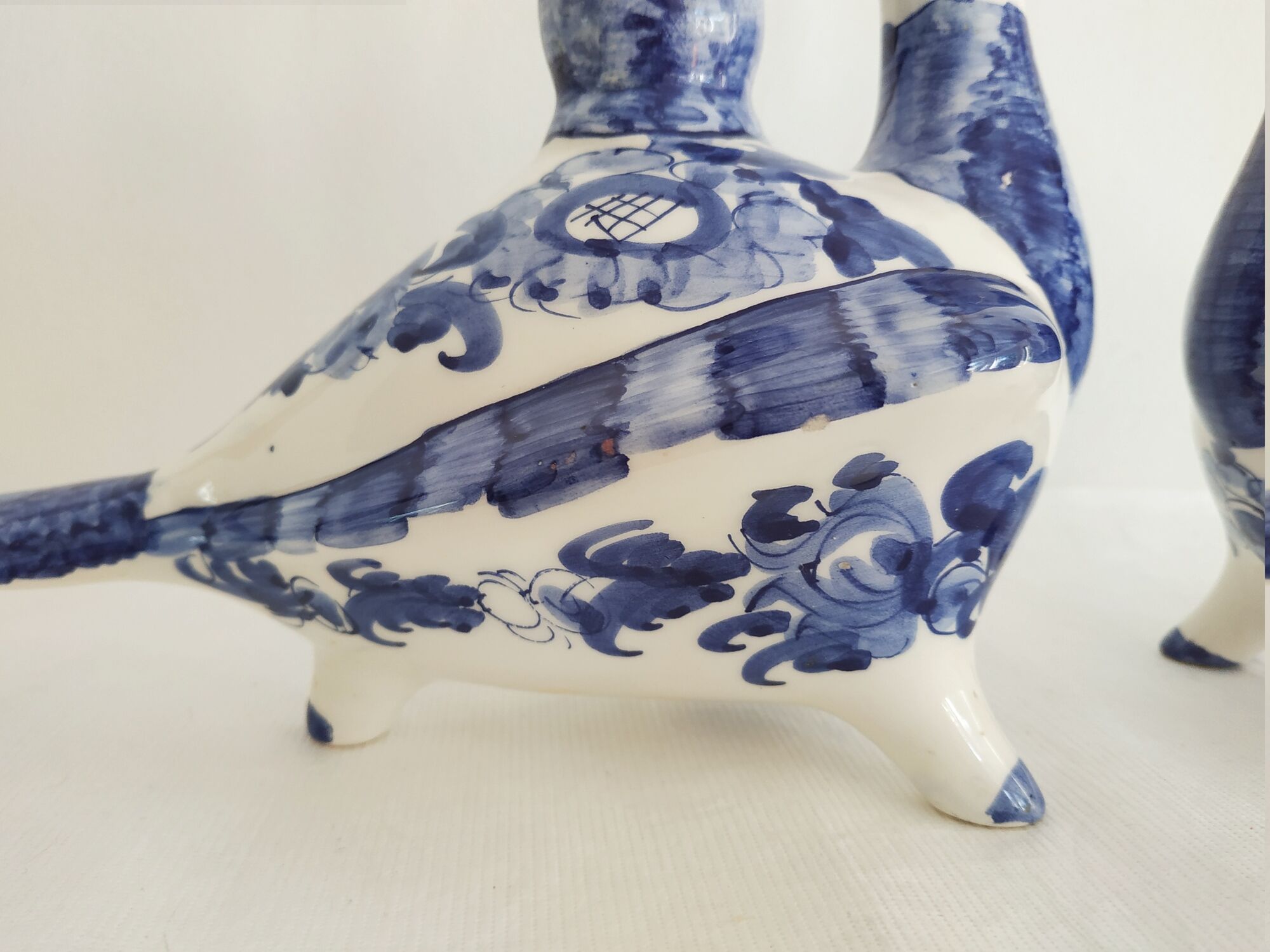 Pair of bird candlesticks in blue white, Skyros earthenware