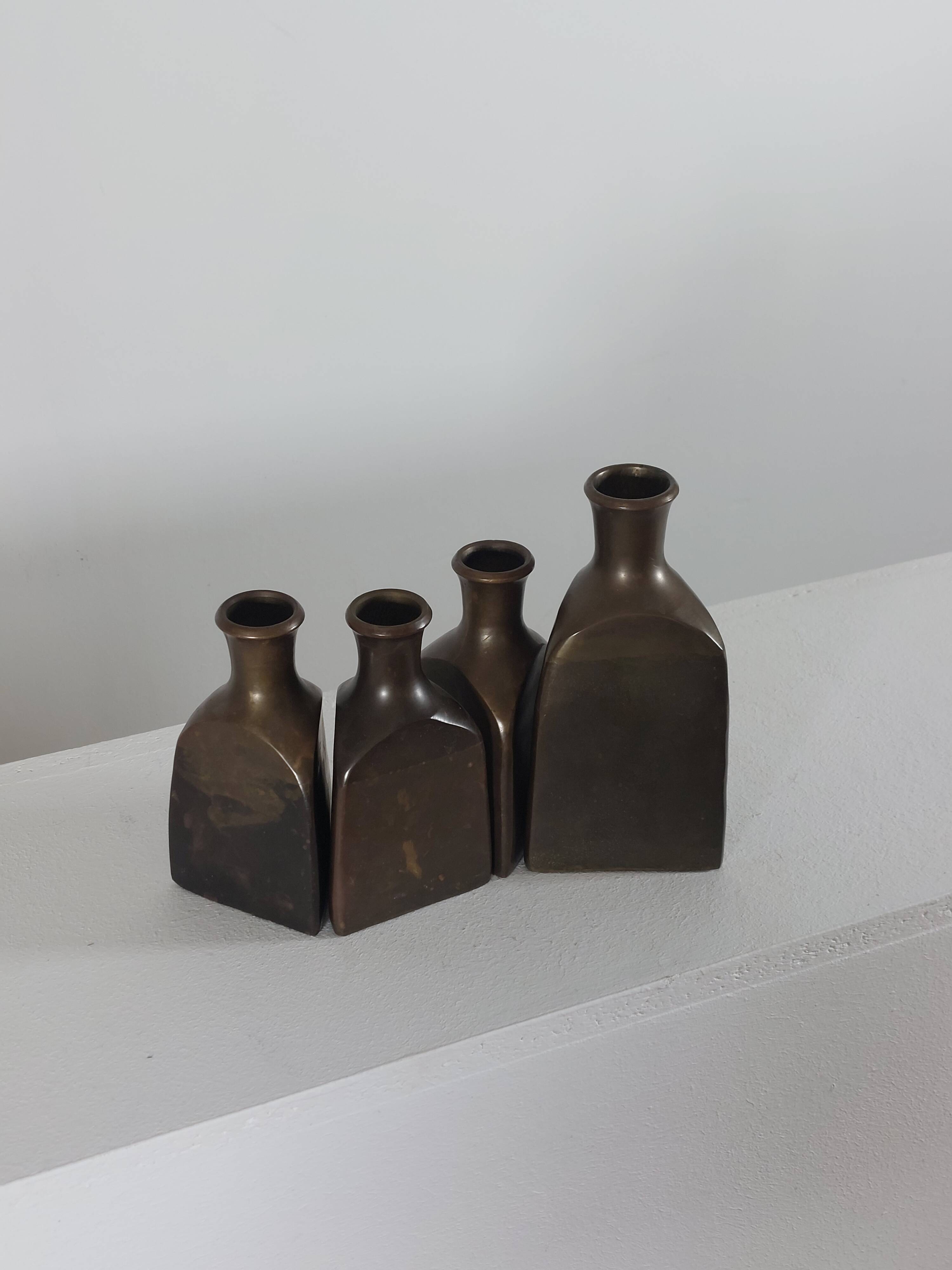 Vintage mid century Set of four triangular brass vases