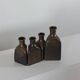 Vintage mid century Set of four triangular brass vases