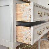 Louis XVI style chest of drawers known as sauteuse