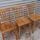 Set of 7 mismatched bistro chairs