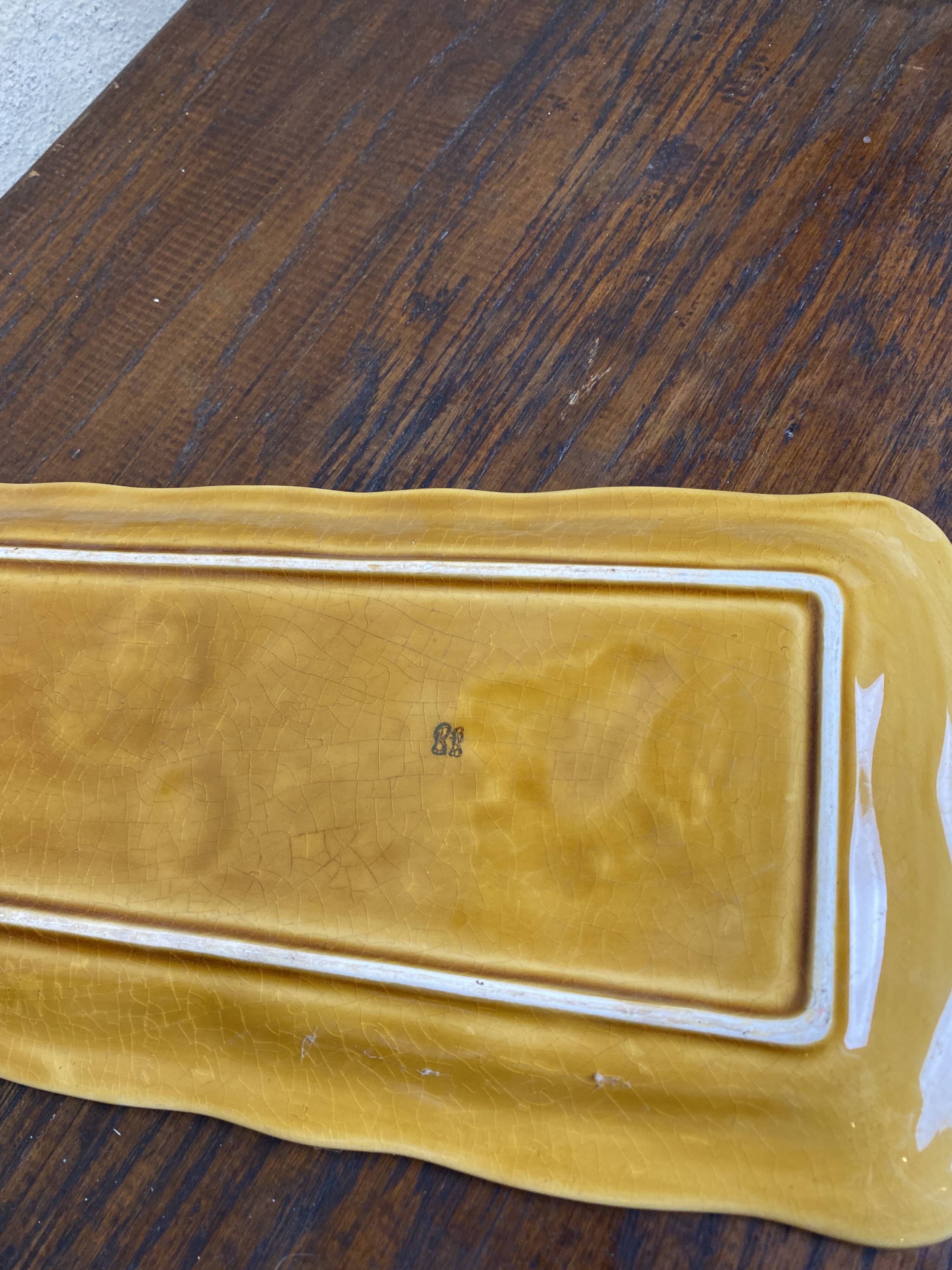 Elongated dish in yellow Digoin Sarreguemines Barbotine