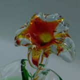 Cup has blown glass jewelry