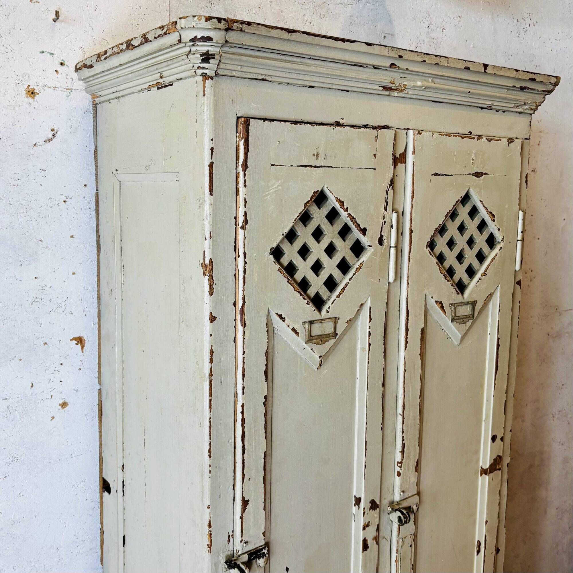 Old factory lacquered pine locker from early 20th century France.