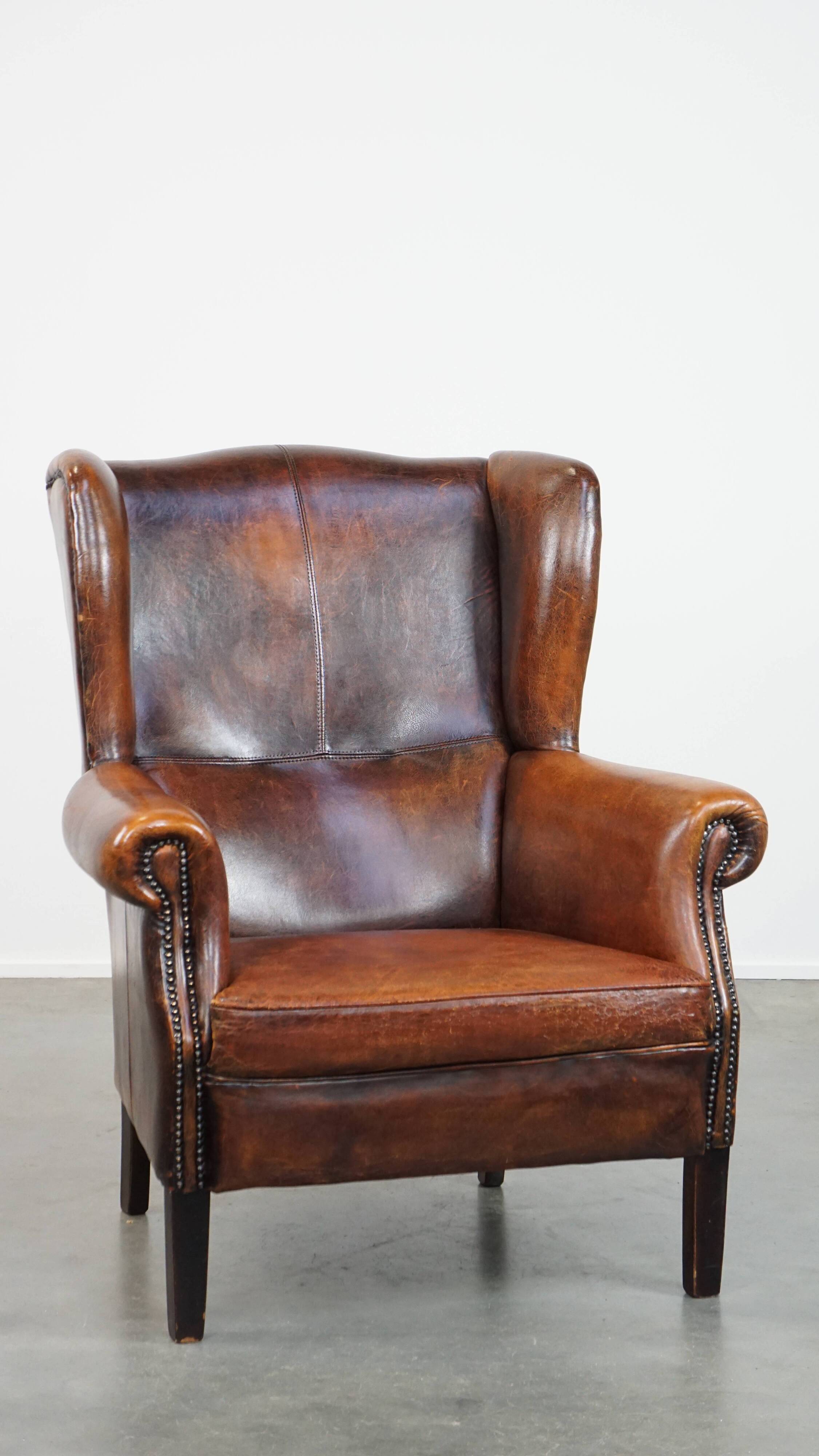 Vintage sheep leather wingback chair