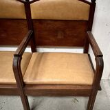 Art Deco two-seater bench in solid mahogany, 20th century.