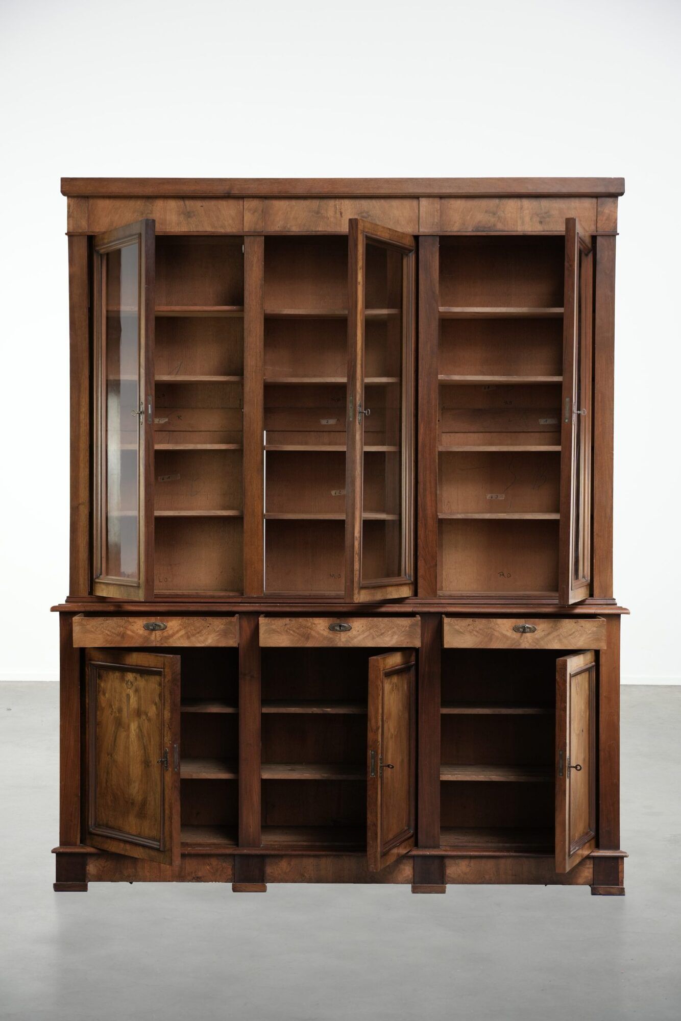 Antique English buffet/bookcase from the 19th century with original glass