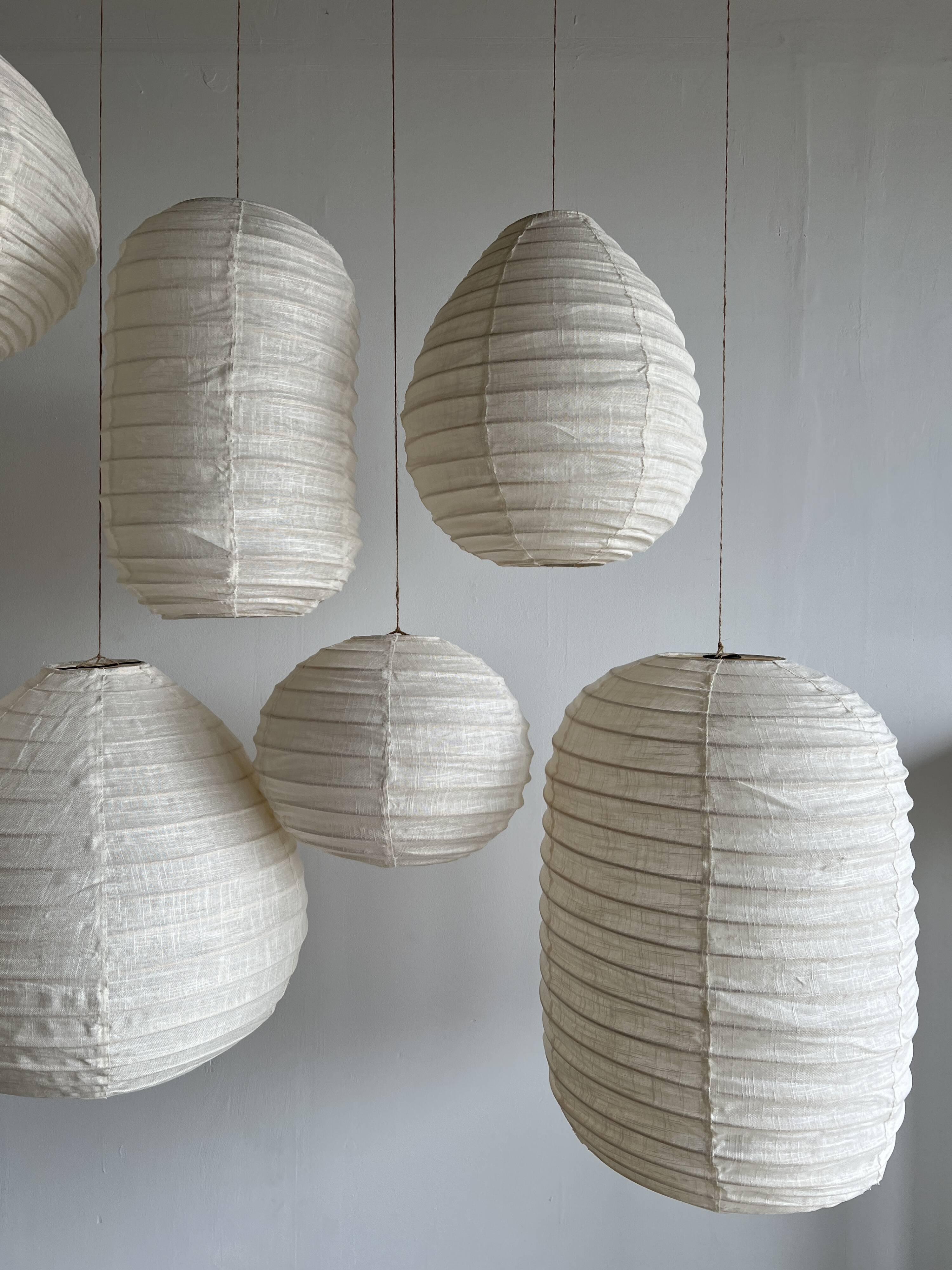 Small Japanese-style natural rattan and linen pendant light in the shape of a drop H40 D35
