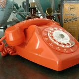 Old orange vintage dial phone