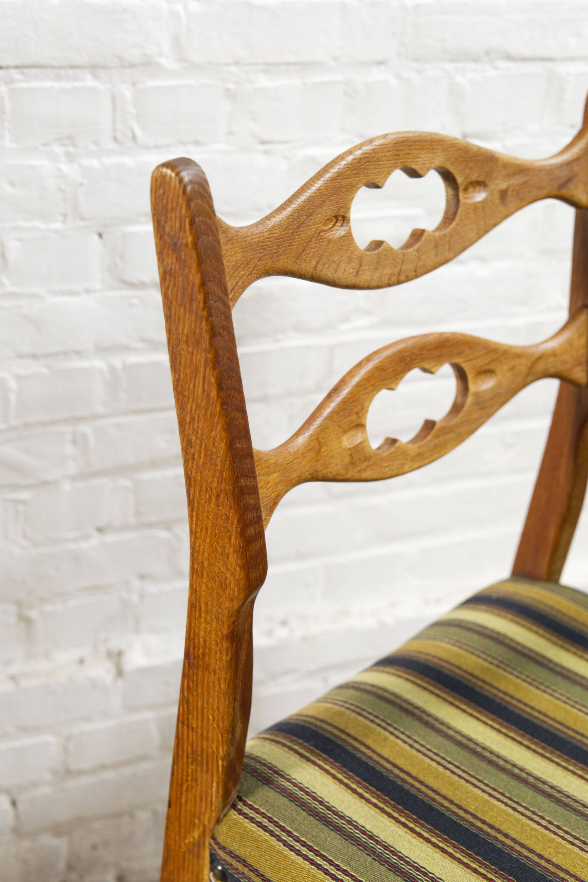 Set of four oak and wool dining room chairs by Henning Kjaernulf, 1960's