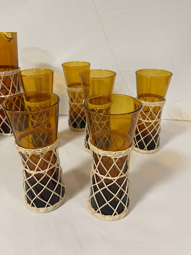 Service à orangeade verre ambré et rotin année 60