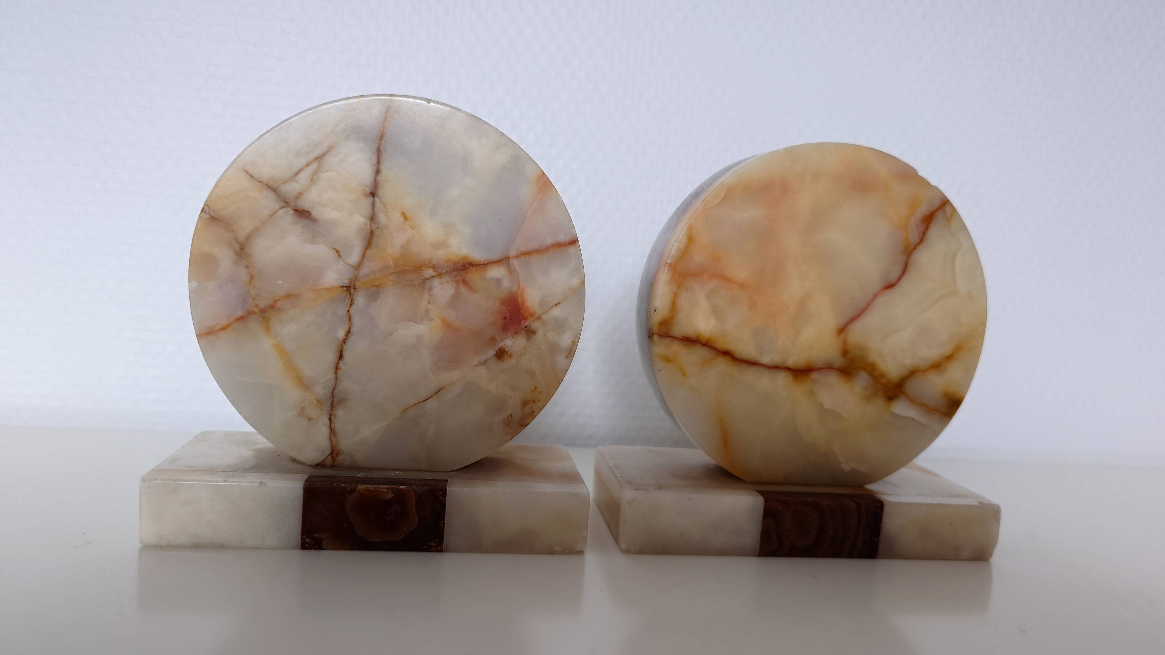 Pair of marble and onyx bookends, geometric design, Art Deco style.