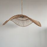 Rattan suspension or lighting fixture in the shape of an undulating circular tray with lattices