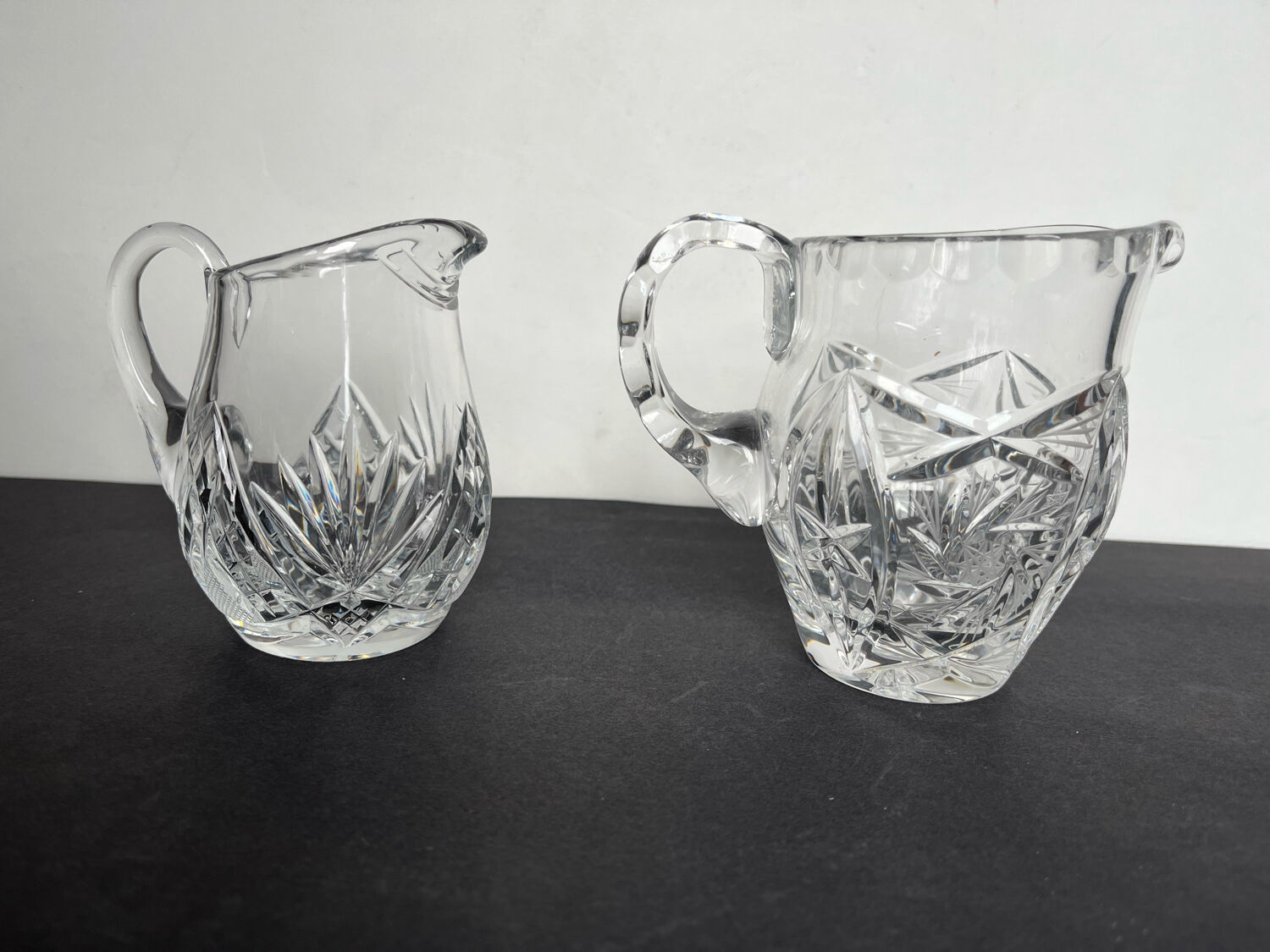 2 crystal pitchers
