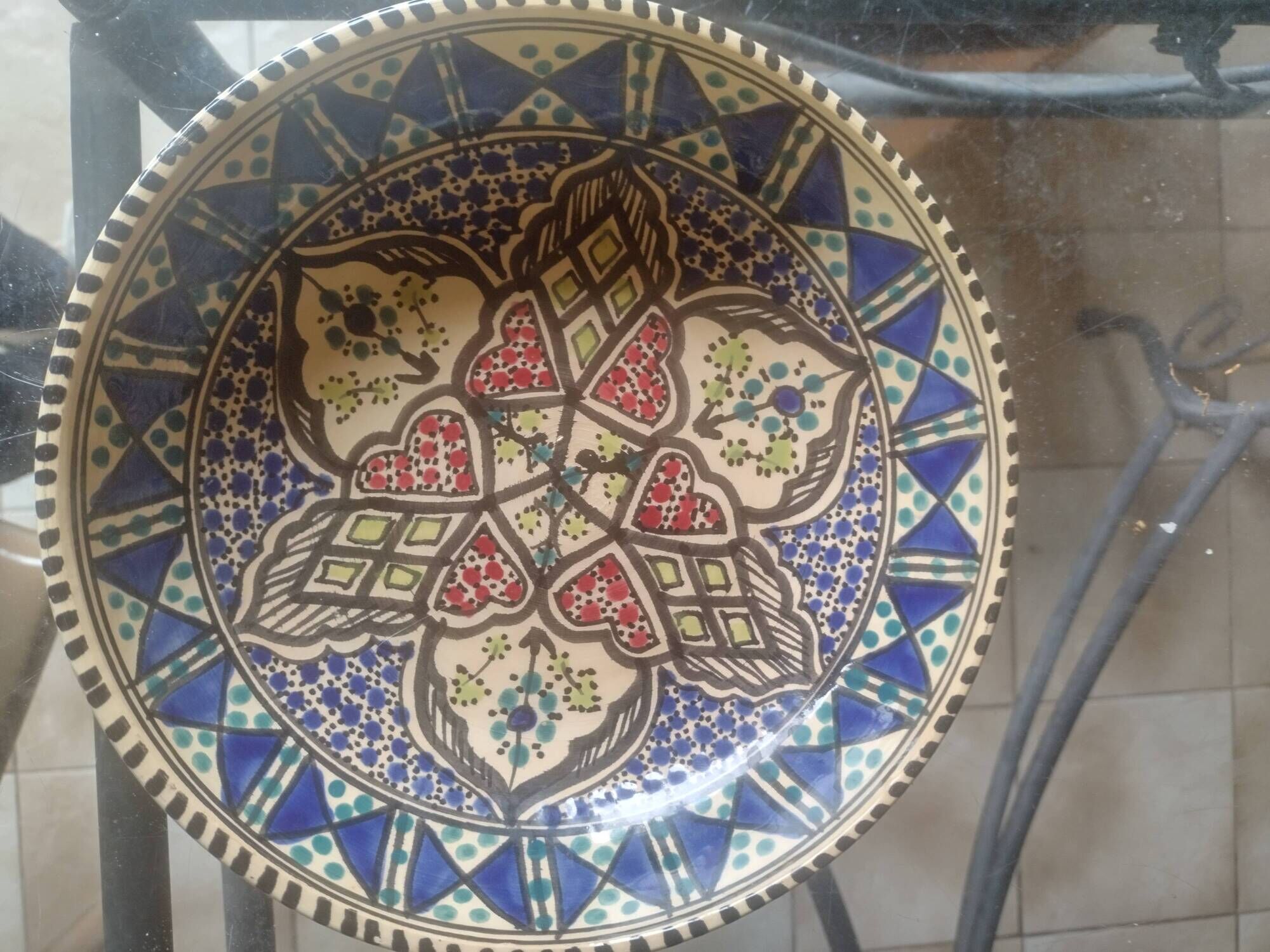 Antique Tunisian ceramic plate, signed and numbered.