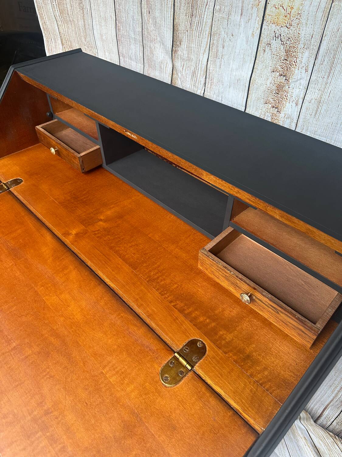 Wooden and black secretary desk