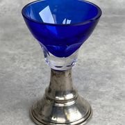 Set of 5 coloured stemmed glasses on silver stems.