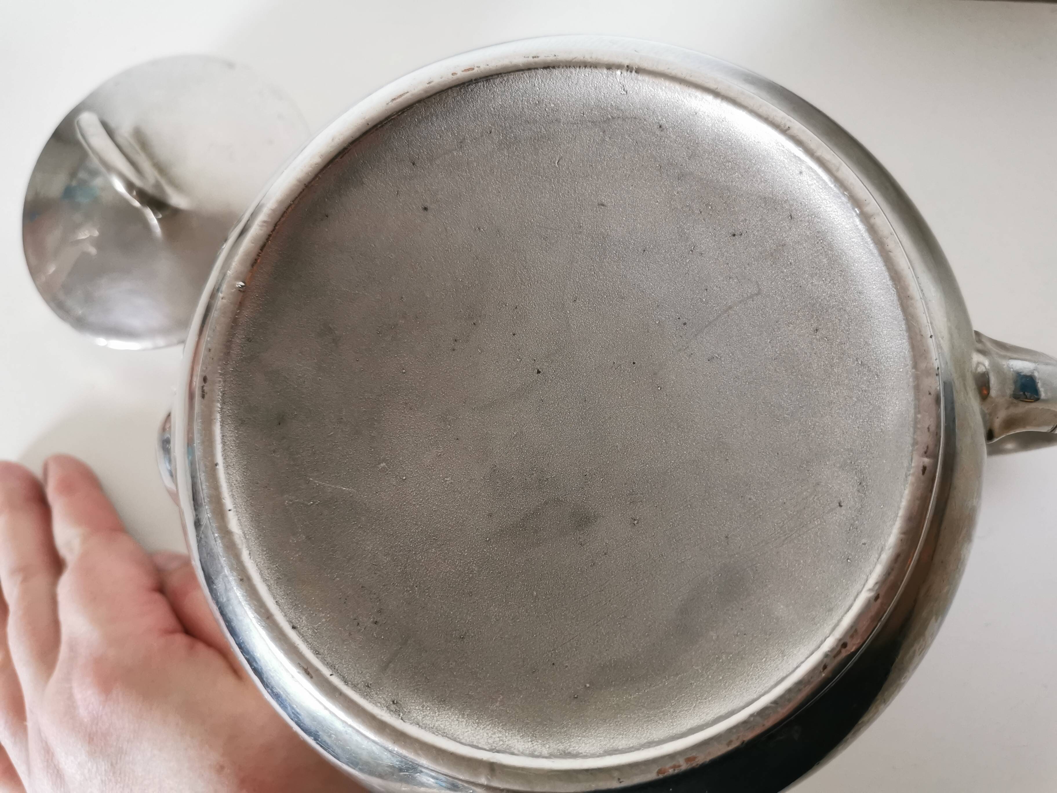 vintage teapot covered with silver metal