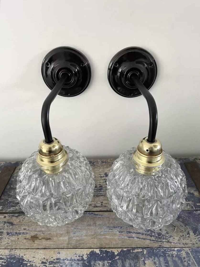 Pair of chiseled glass wall sconces