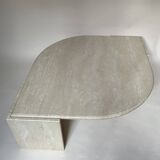 Travertine eye-shaped coffee table