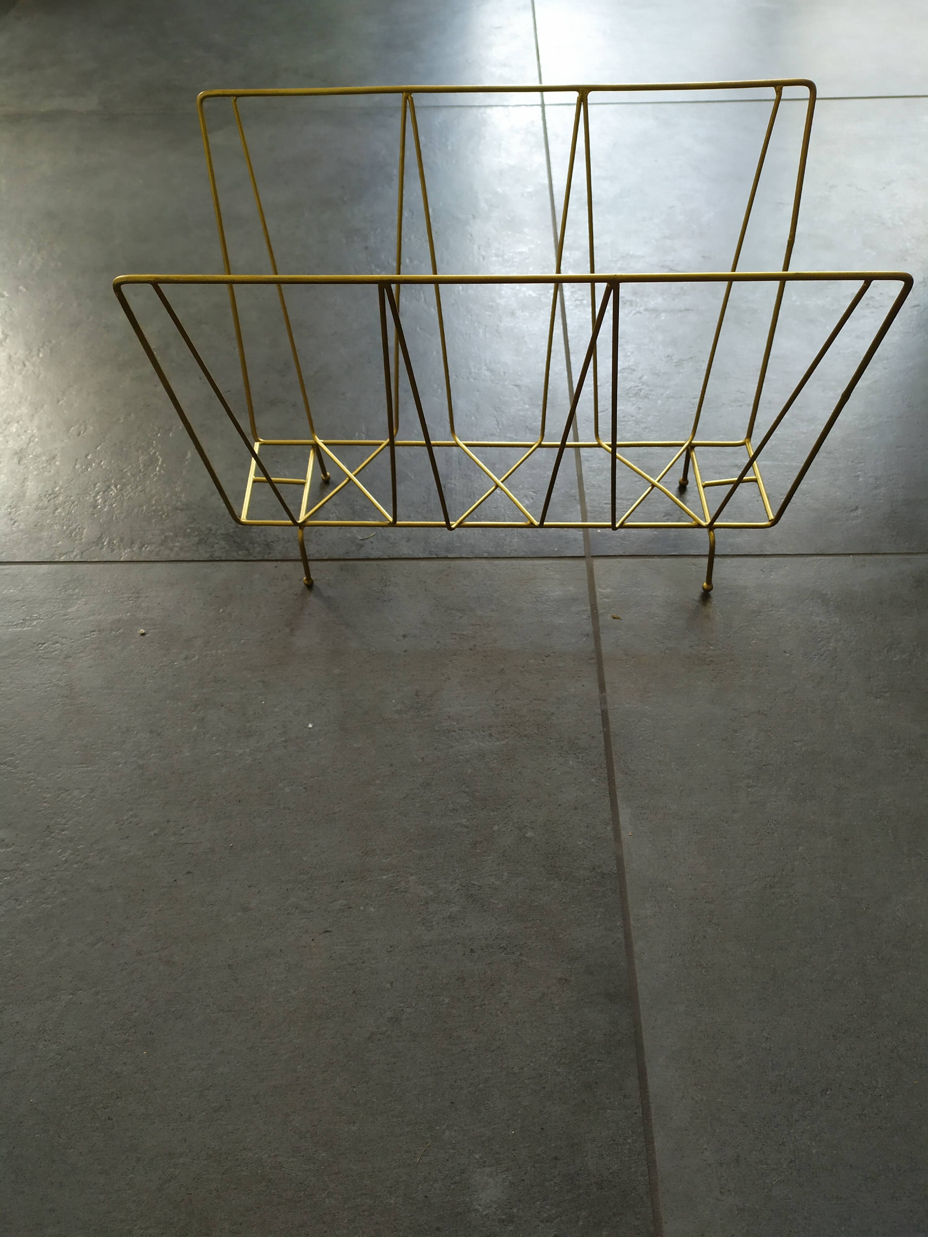 Gold metal magazine holder