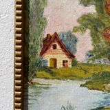 Small landscape painting with golden frame