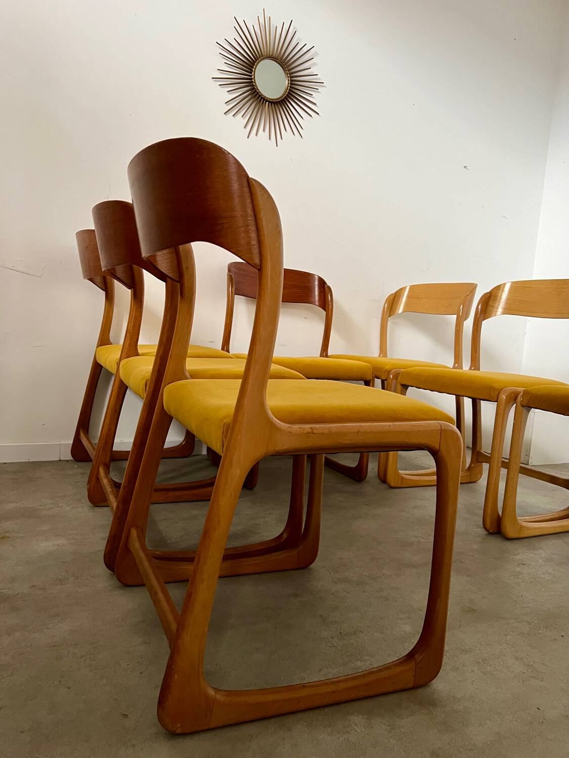 Set of 7 Baumann sled chairs in wood and mustard yellow fabric, 1960s