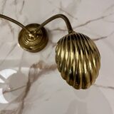 Articulated shell wall light