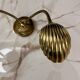Articulated shell wall light