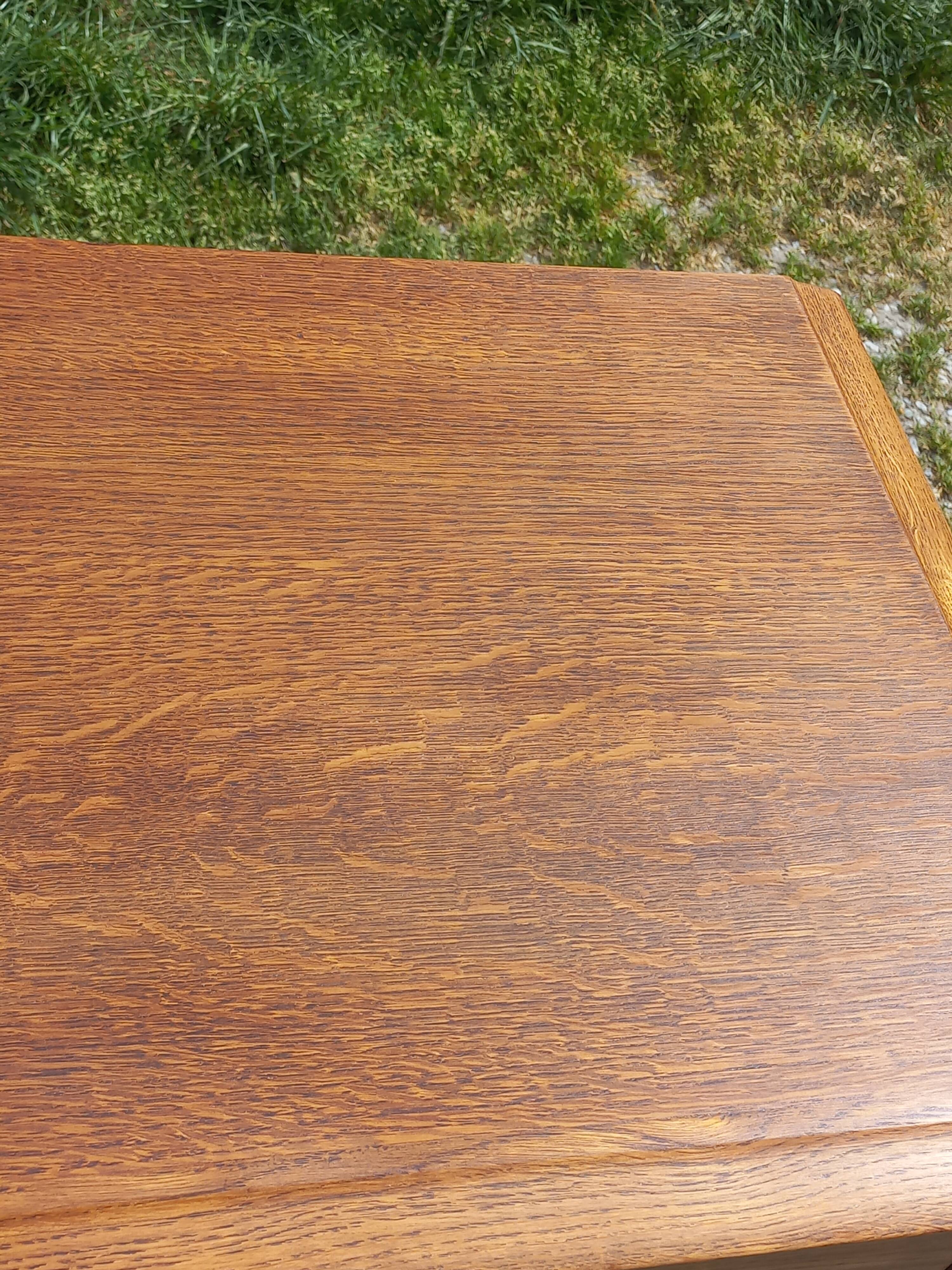 Vintage oak commode with tapered legs from the 1950s.