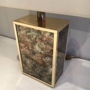 Lamp in gilded metal and stylized glass. In the style of Aldo Tura