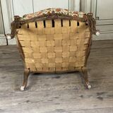 Regency style armchair in gilded wood