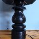Sculptural table lamp made of turned wood