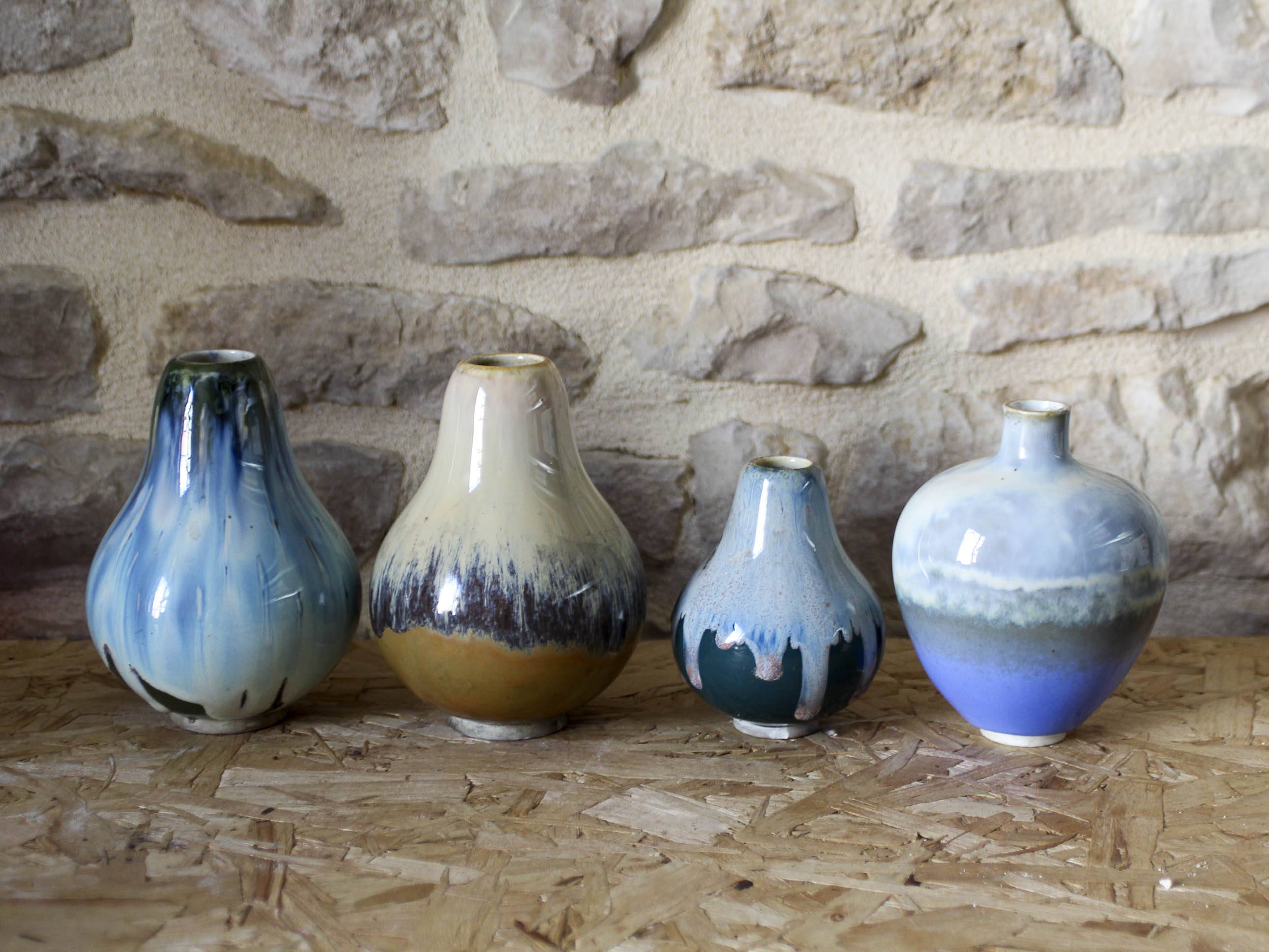 Set of 4 porcelain vases from the early 20th century by François Paul Louchet.