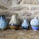 Set of 4 porcelain vases from the early 20th century by François Paul Louchet.