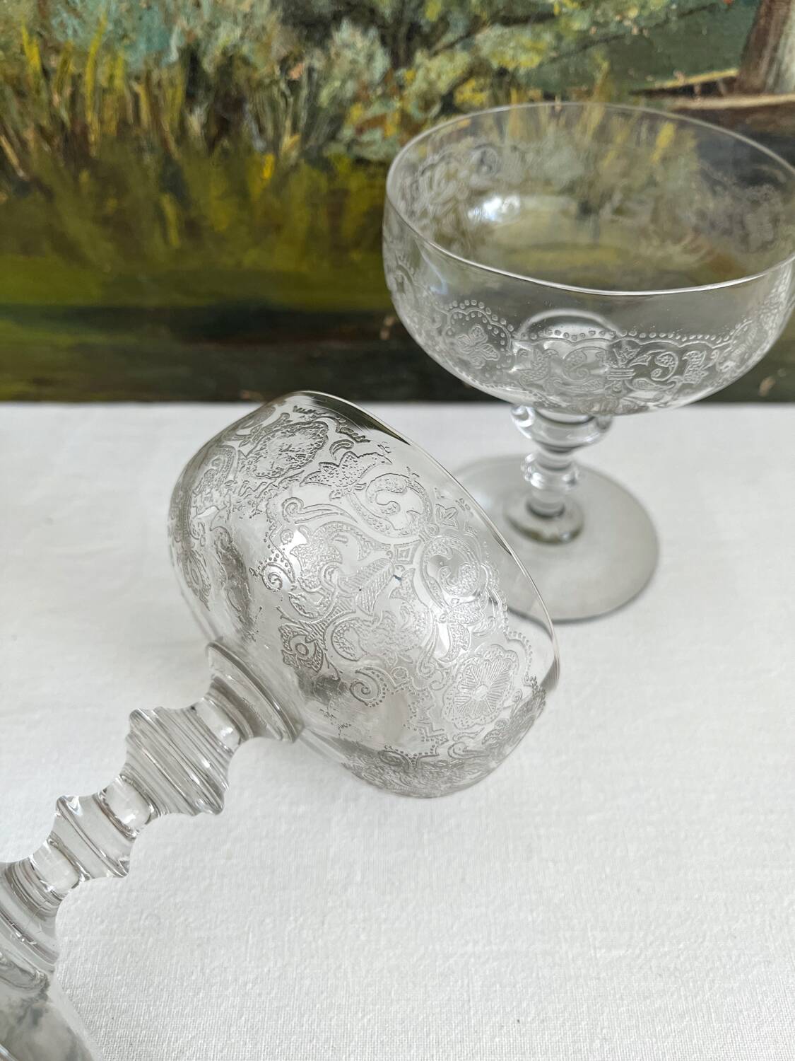 2 antique champagne glasses in engraved glass
