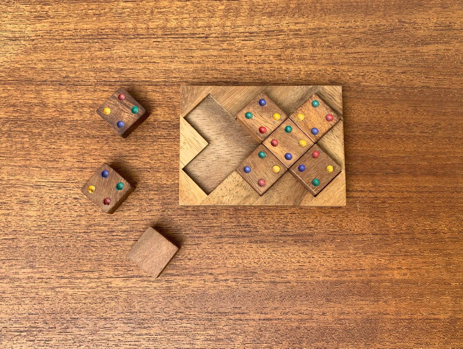 Mid-century Scandinavian teak dice game from the 1960s.