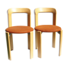 Pair of chairs in fabric orange Bruno Rey